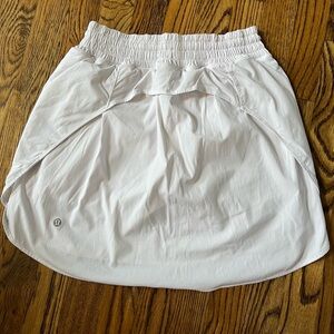Lululemon women’s skirt size 8 LONG. Excellent condition- barely worn.